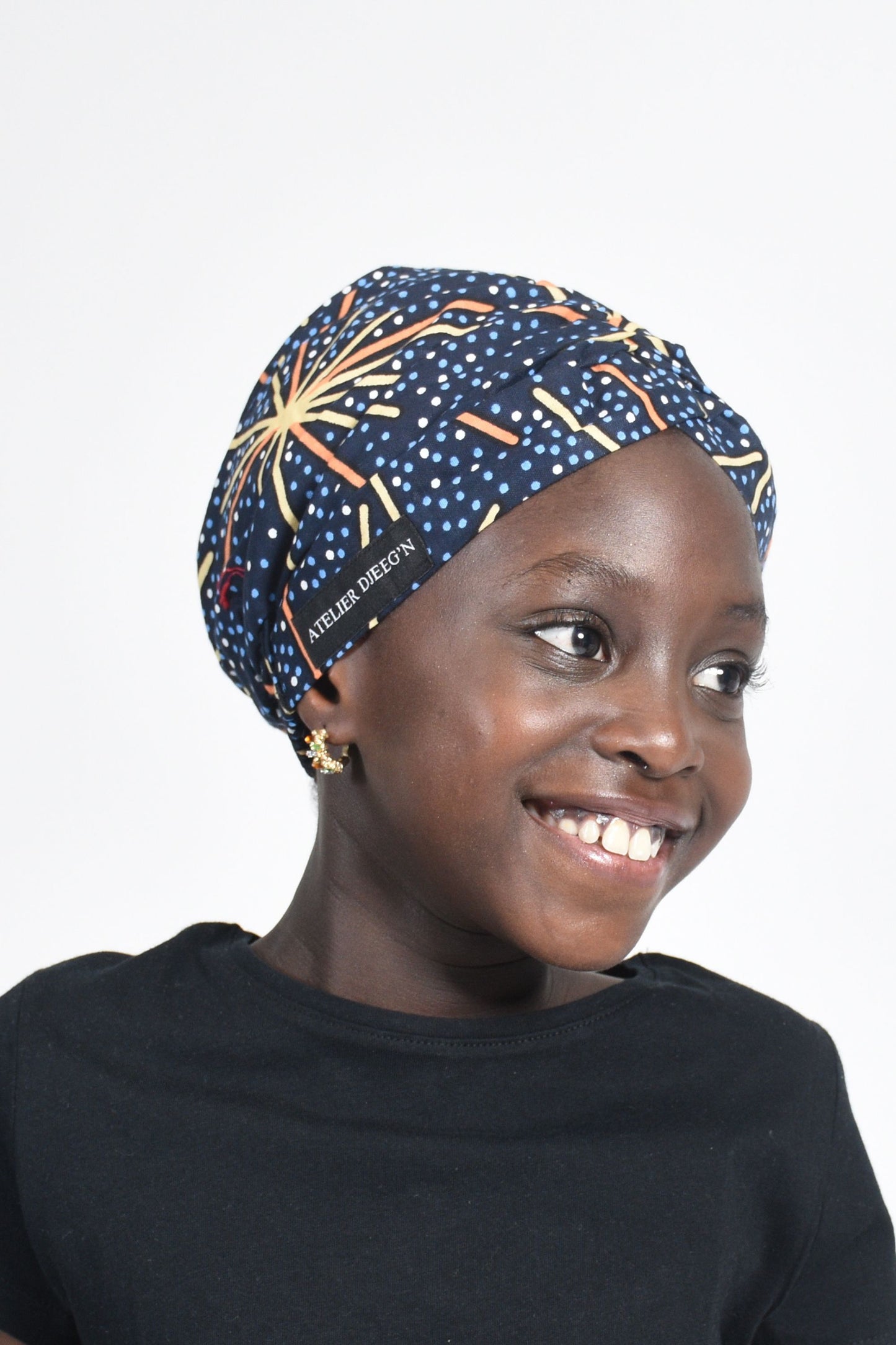 Bonnet beanie pour Enfant en Wax Imprimé Etoile, Doublure en Satin par Atelier DJEEG'N 1