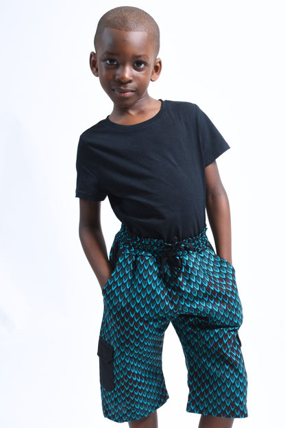 Cargo Bermuda Shorts in Vibrant African Blue Green Scales Print and black Accents for Boys by Atelier Djeeg'n 1