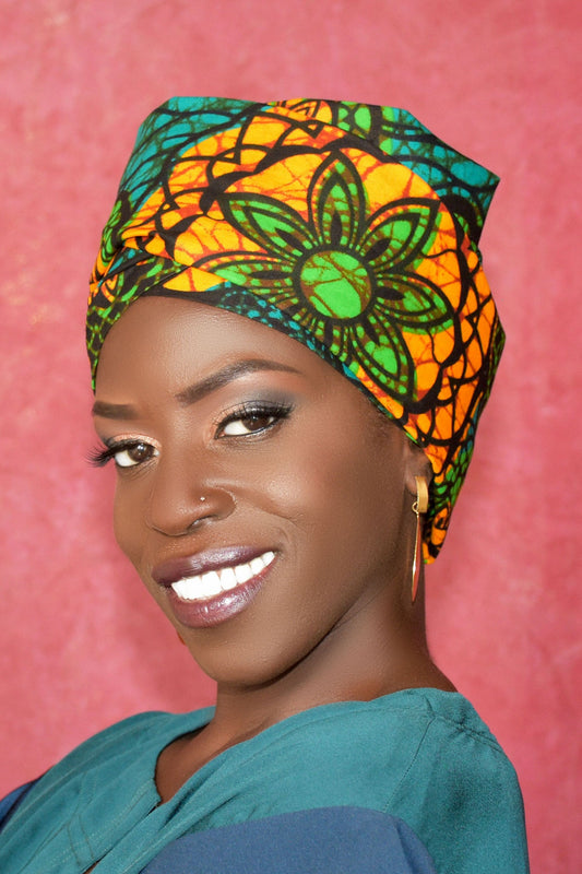 A Pre Made Headwrap in Green and Orange African Ankara Print By Atelier Djeeg'N